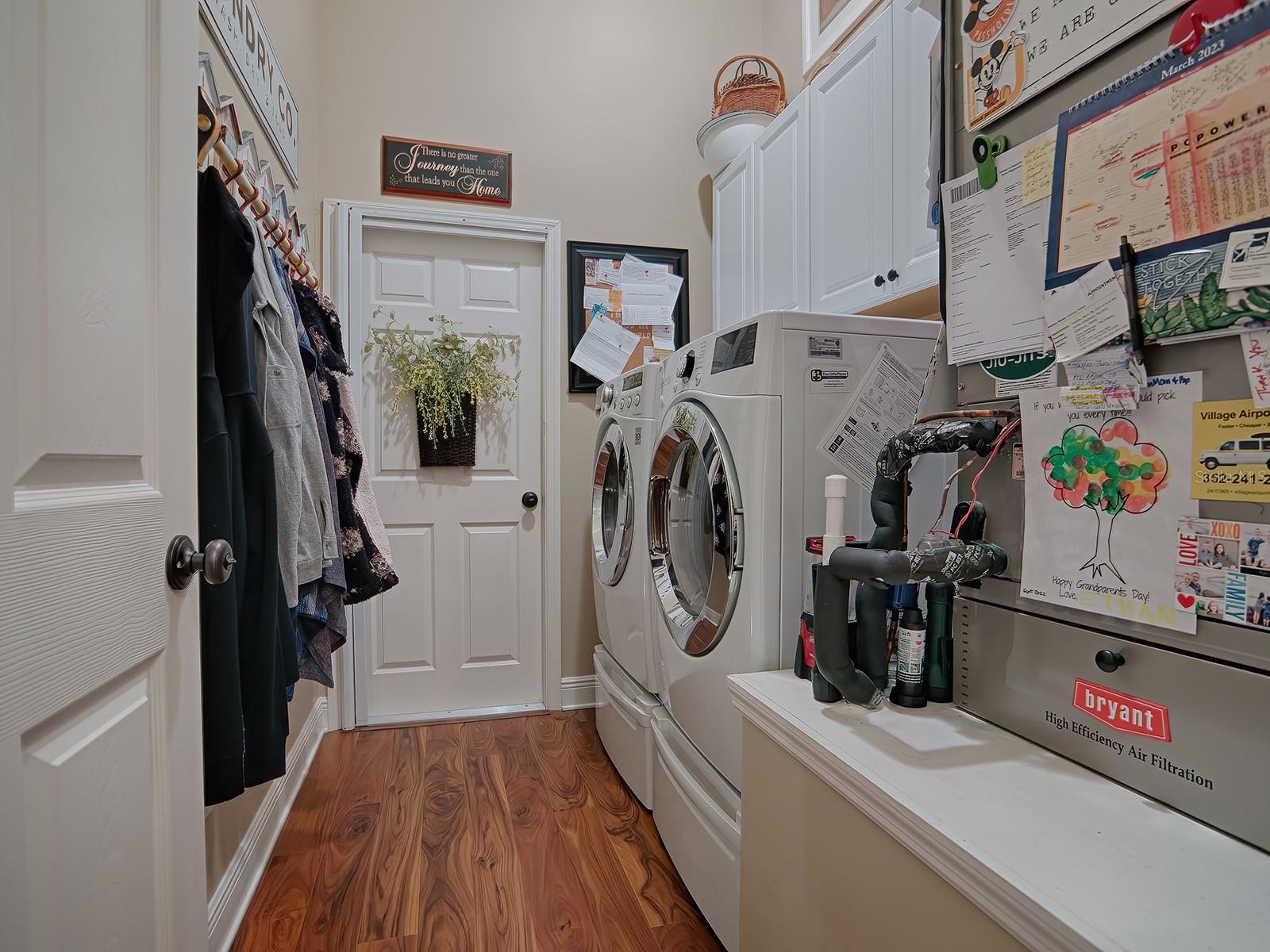 LAUNDRY ROOM WITH CABINETS
