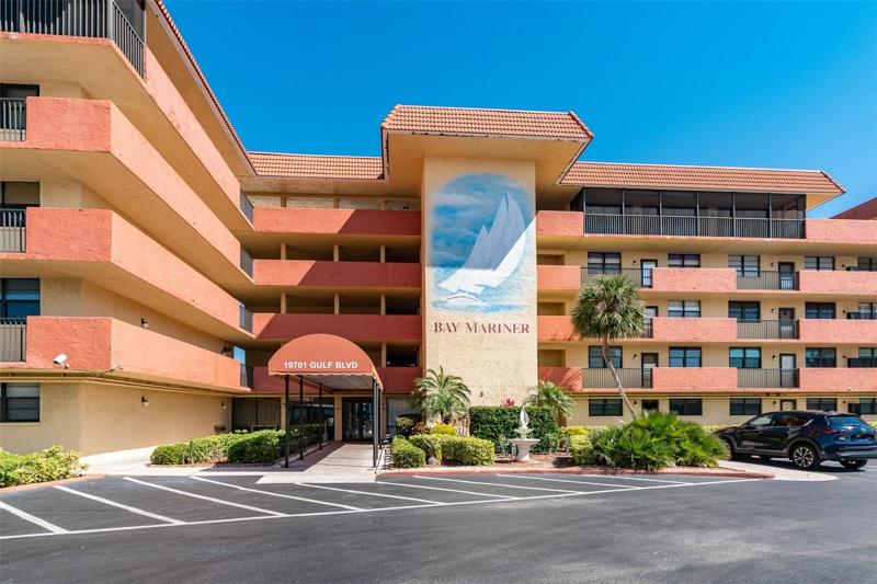 Front building entrance, unit in back ground
