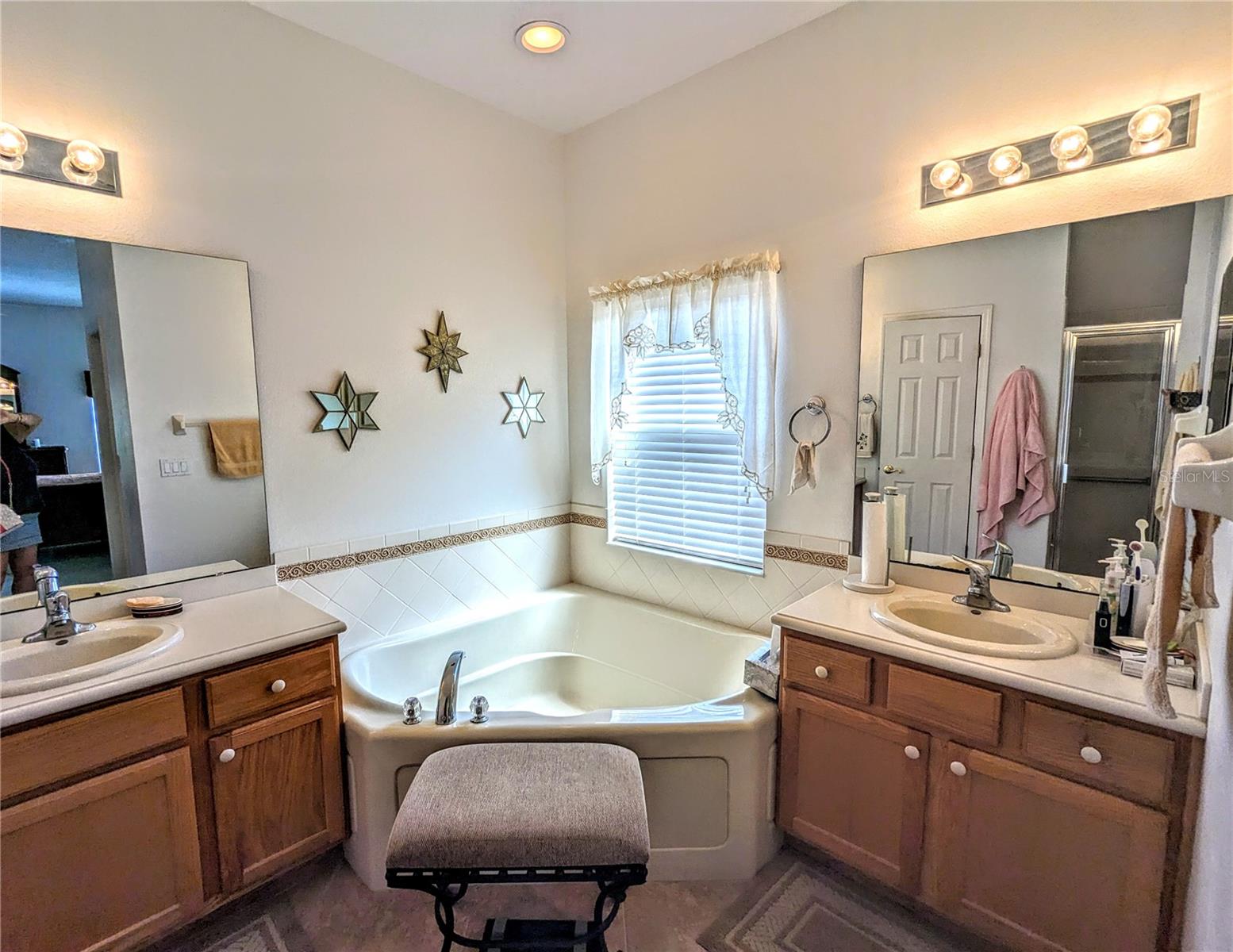 master bath with garden tub and separate shower