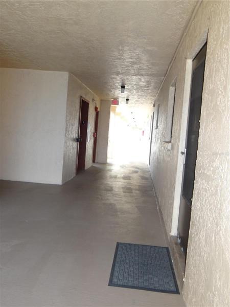 Unit is located steps from the elevator