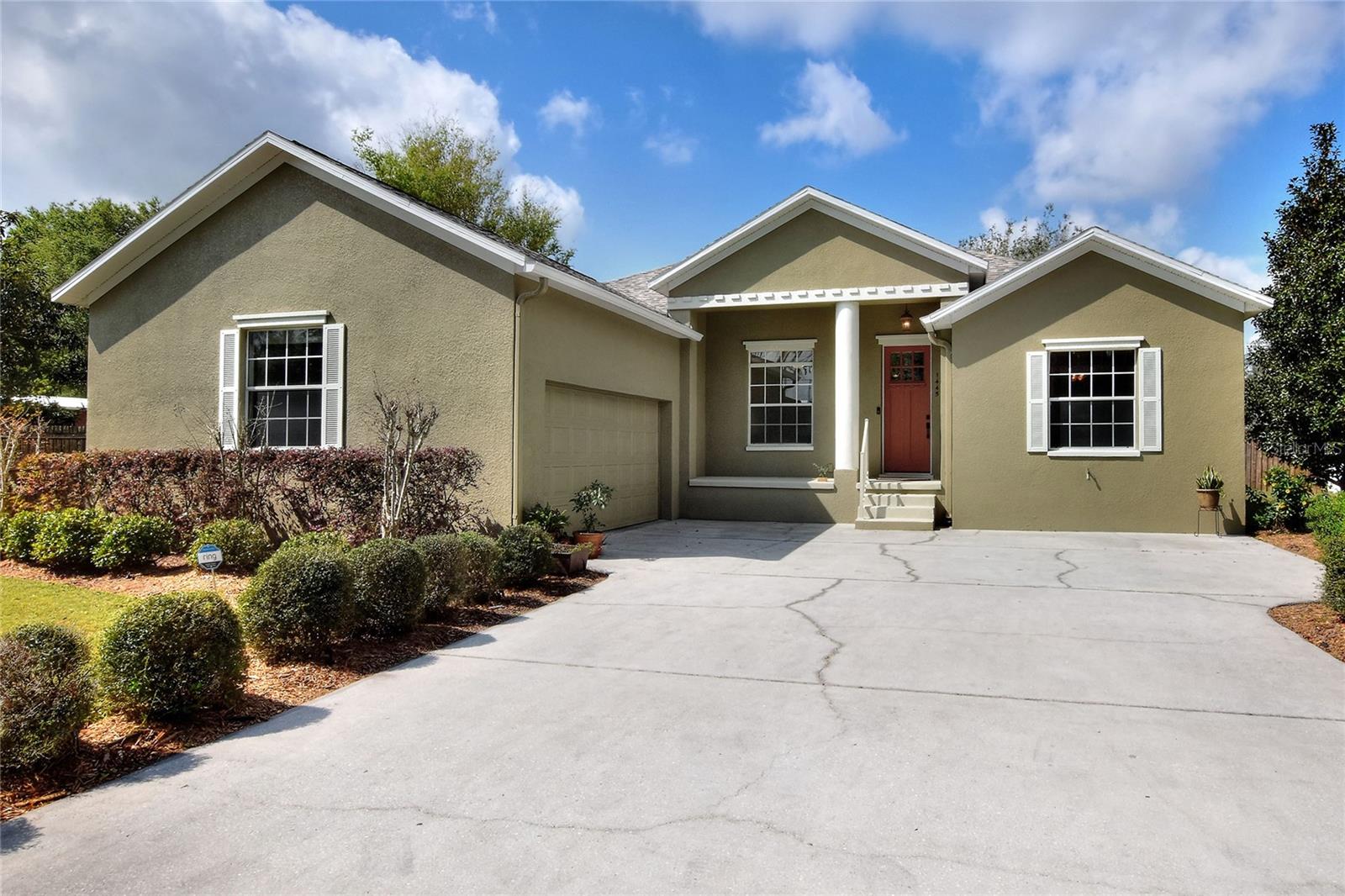 Front of the home with a 2 car garage. 