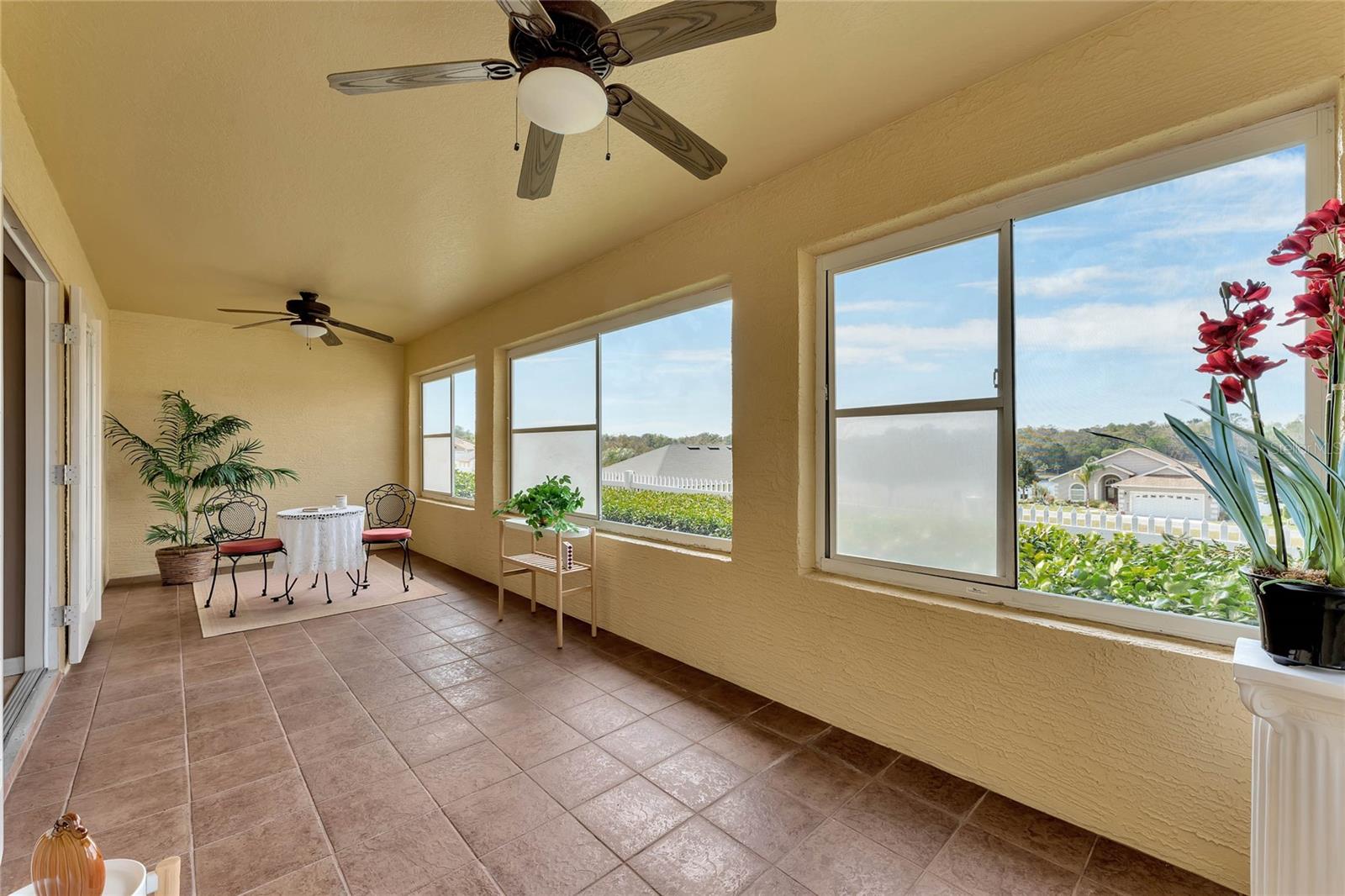 Florida room has slider windows to open allow the breezes in