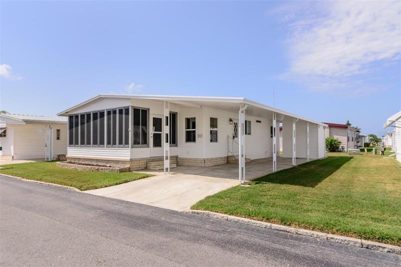 This 55+ mobile home park has a gated entrance and many activities for residents