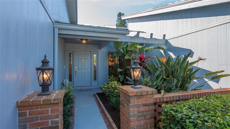 Private courtyard entry lives like a single family home