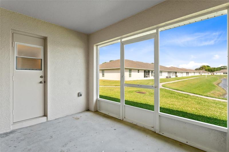 Rear screened patio with access to Master Bathroom