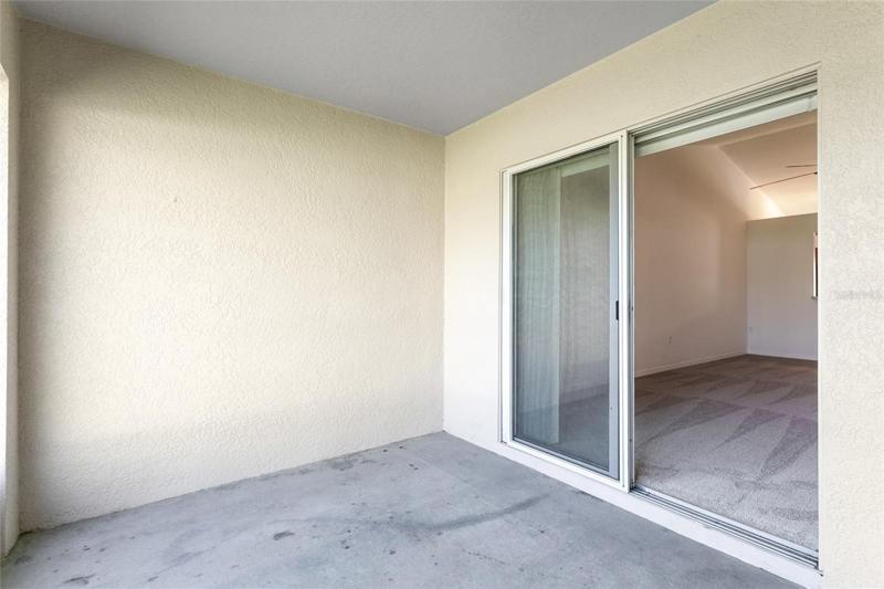 Rear screened patio from living room sliding doors.