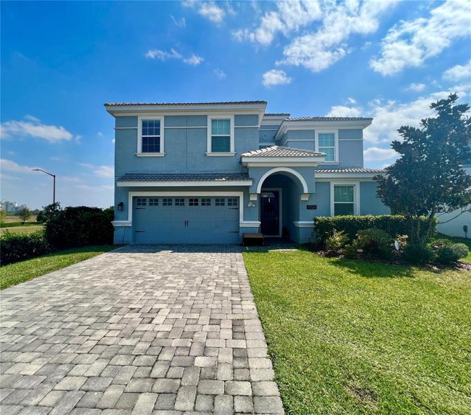 Front of the house/paved driveway