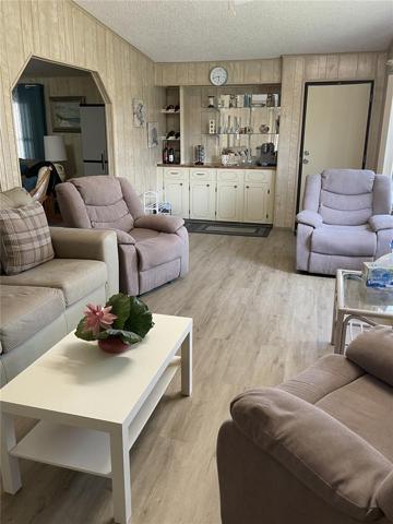 Large family/Florida room, vinyl plank flooring was just installed 03/2023