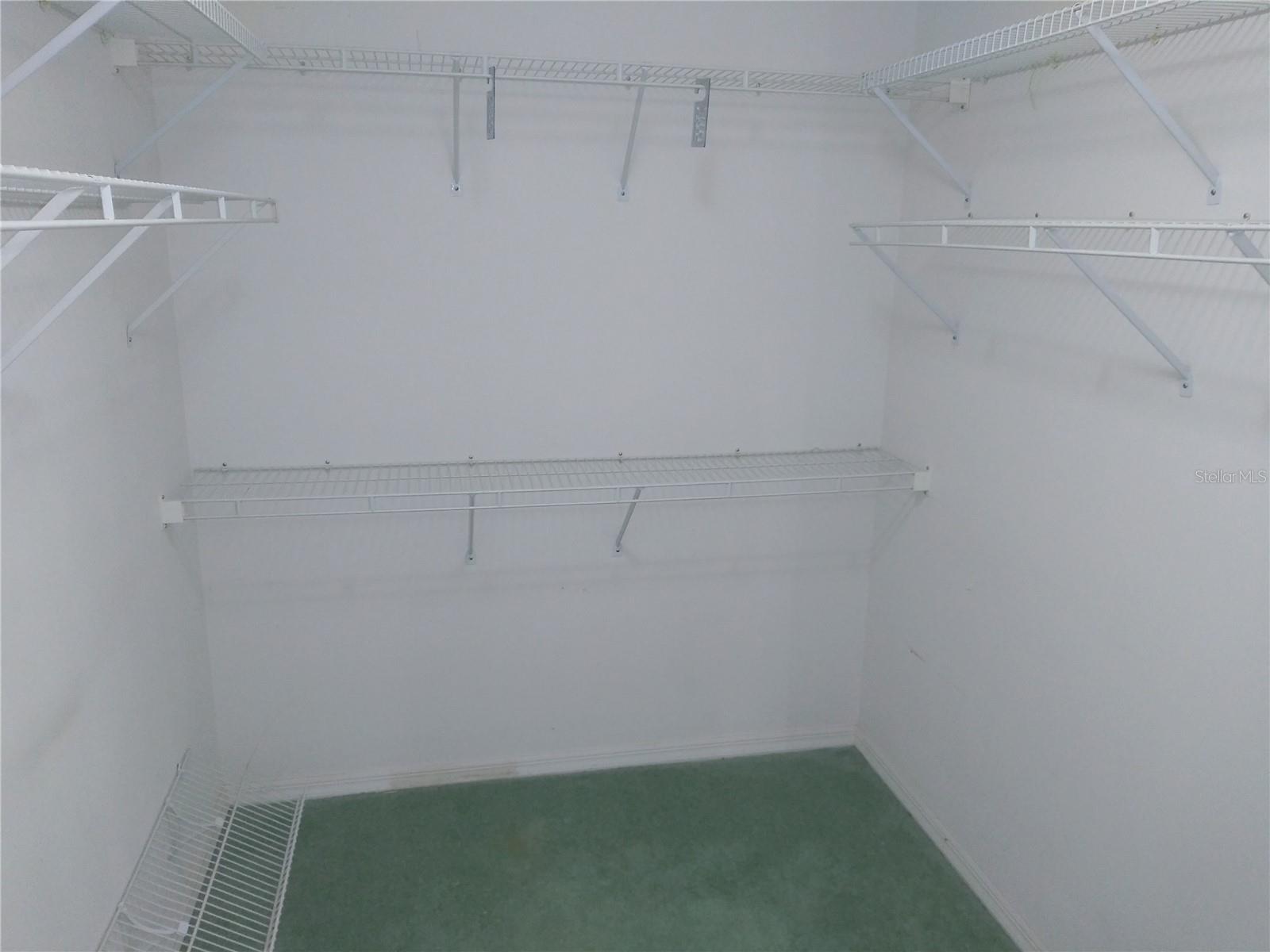Large master bed closet.
