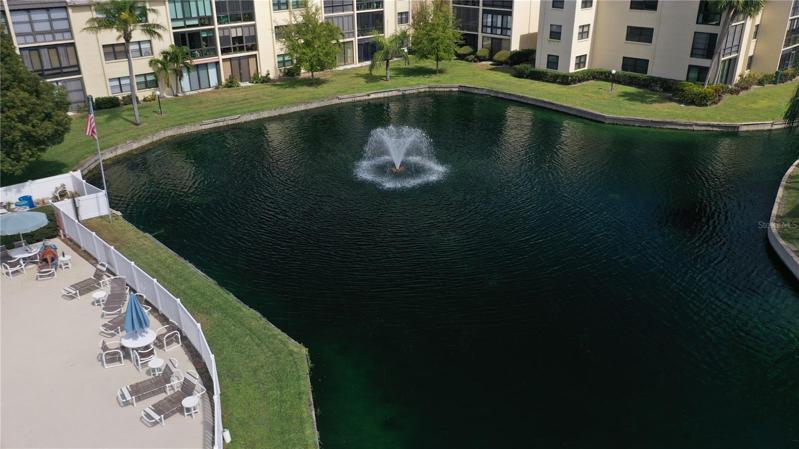 Wide Aerial View Pool nearby, Lake w/ Water Fountain