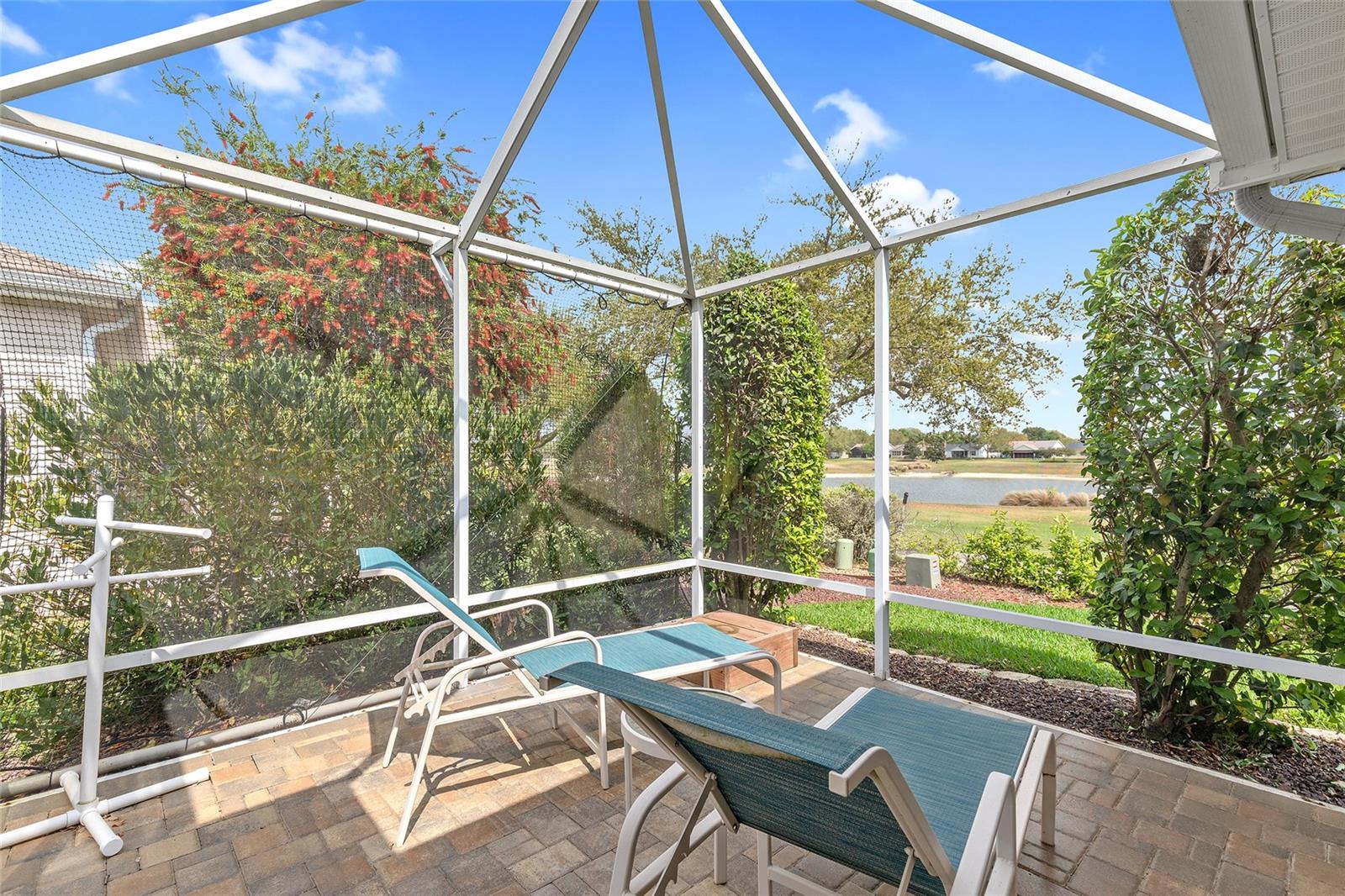 ENJOY THE AMAZING GOLF COURSE VIEW AND THE OUTDOORS FROM THE PATIO WITH SCREENED BIRDCAGE, WIRED FOR HOT TUB