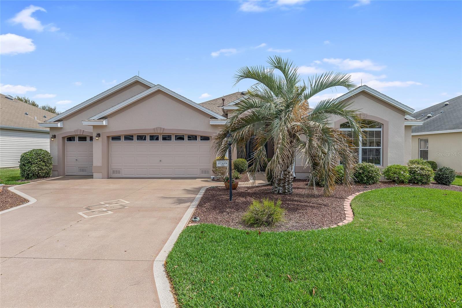 PAINTED DRIVEWAY AND GOLF CART GARAGE