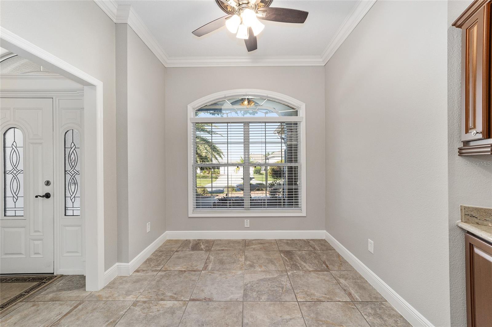 CASUAL DINING KITCHEN NOOK!  THERE ARE 3 TRANSOMS IN THE FRONT OF THE HOME -- THIS ONE, THE FRONT DOOR AND ONE IN THE FRONT GUEST ROOM!