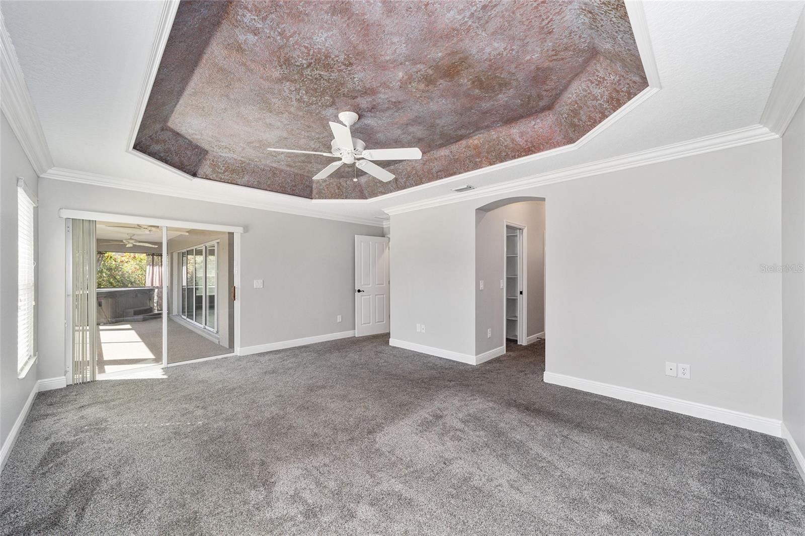 THROUGH THE ARCHWAY YOU WILL FIND 2 WALK-IN CLOSETS AND YOUR EN-SUITE BATH!