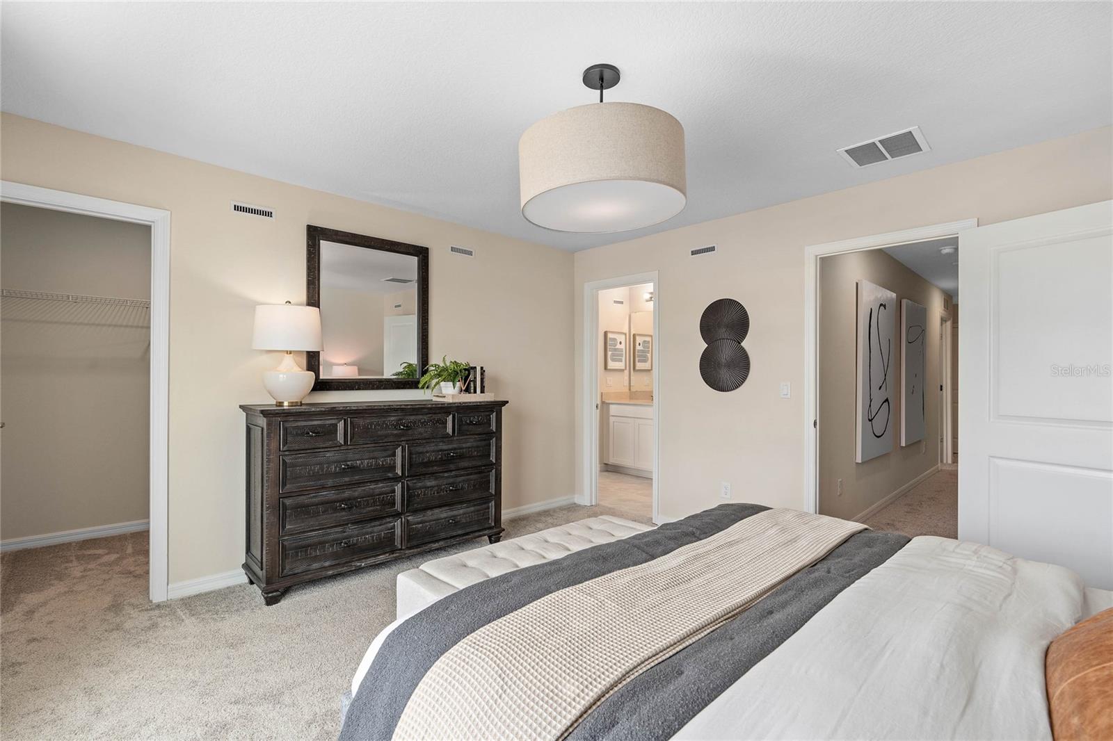 Owner's Suite. Model Home Design. Pictures are for illustrative purposes only. Elevations, colors and options may vary. Furniture is for model home staging only.