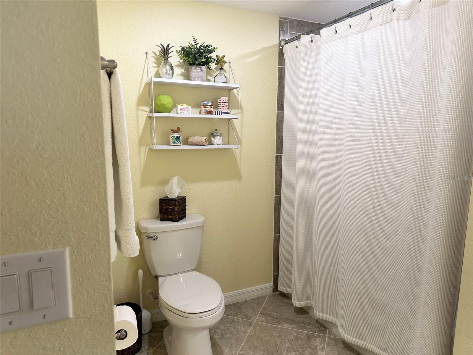 Guest Bath with tub/shower and large vanity