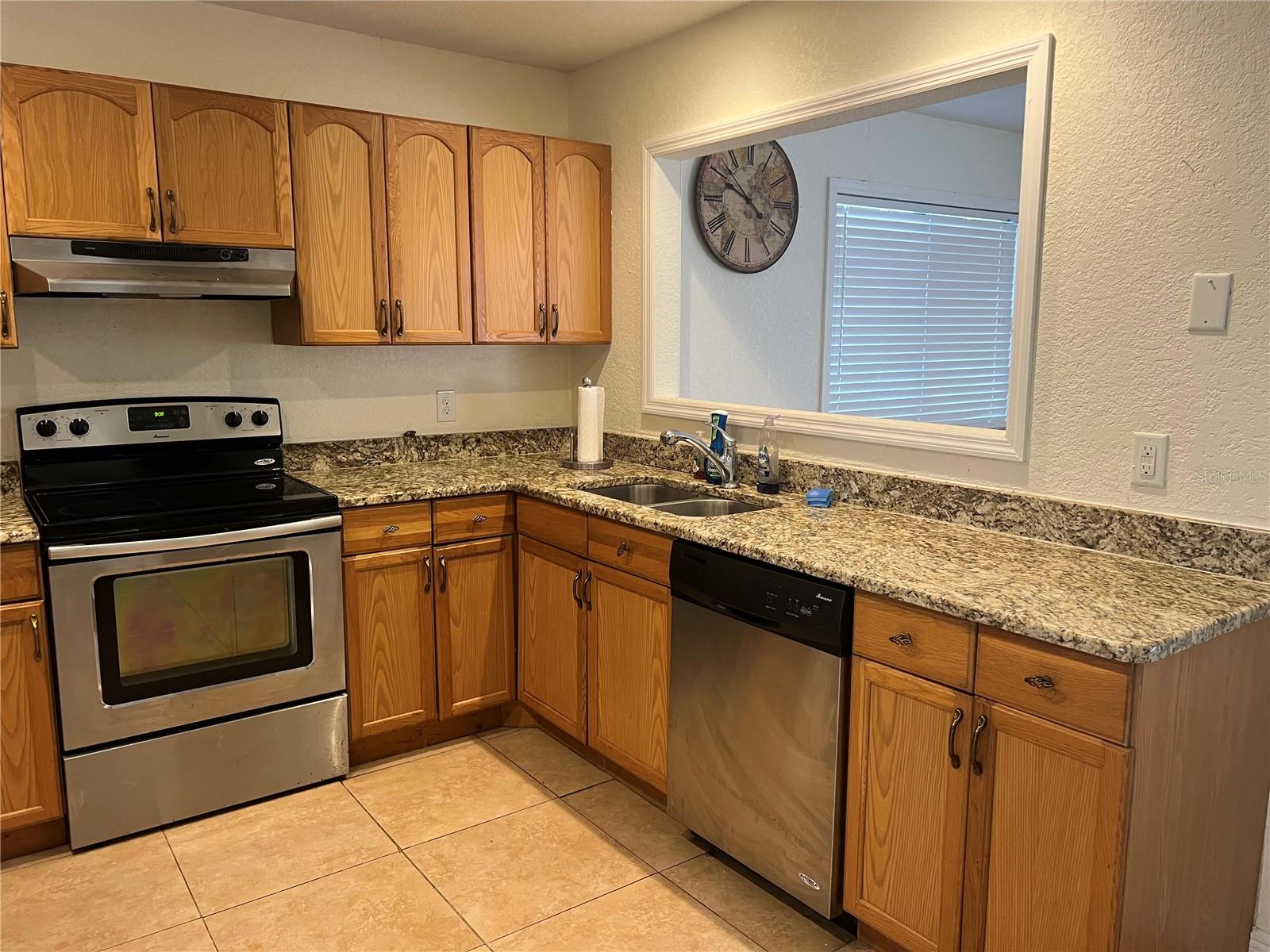 Kitchen with view of the yard and Florida room