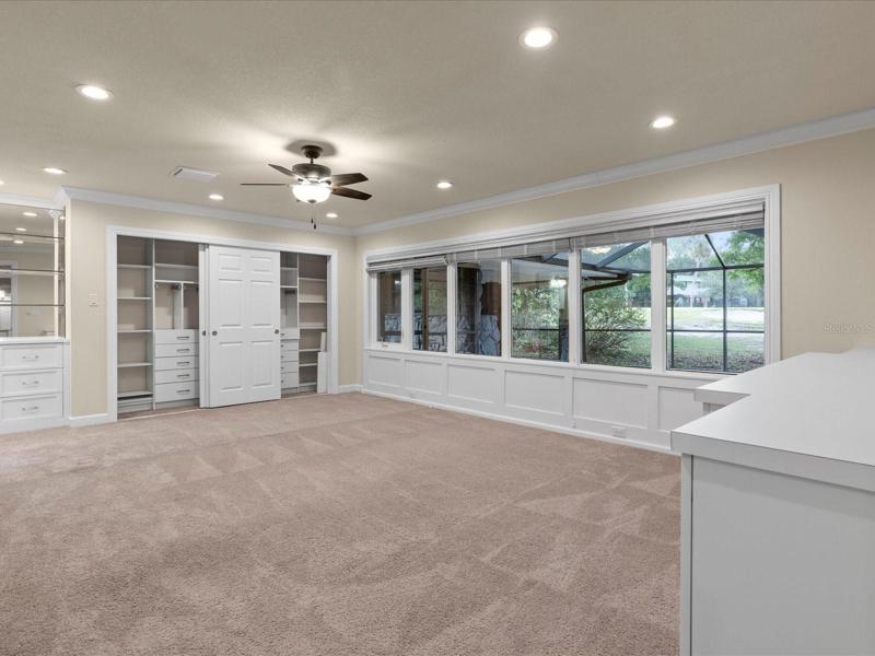 Master Bedroom with Custom Accessory Closets. 