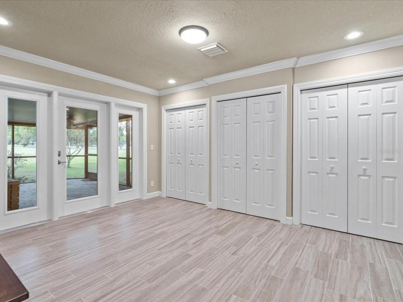 Bedroom #4 with access to screen porch #2. 