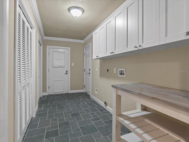 Laundry Room with Cabinets & Closets.