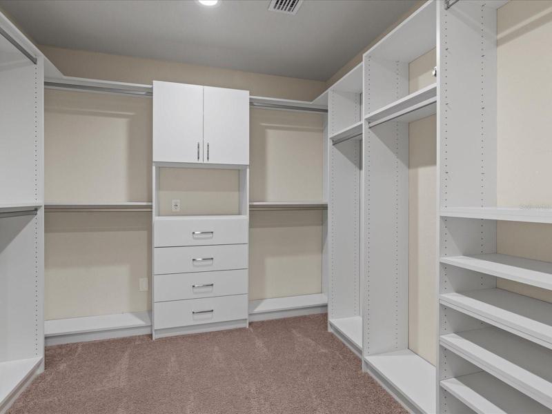 Master Bedroom Closet with Organizers.
