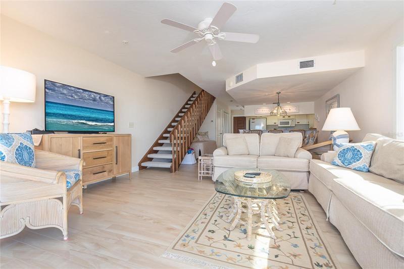Living Area and Stairs to Upper Floor.