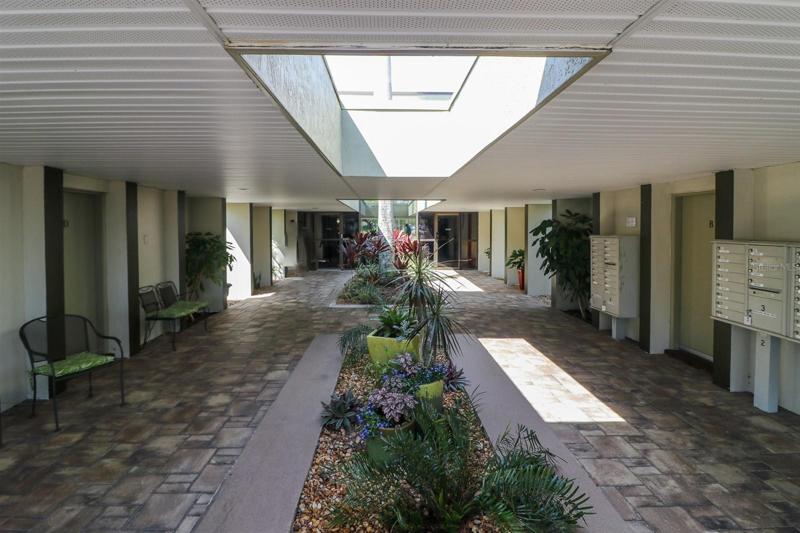 The breezeway houses storage units.