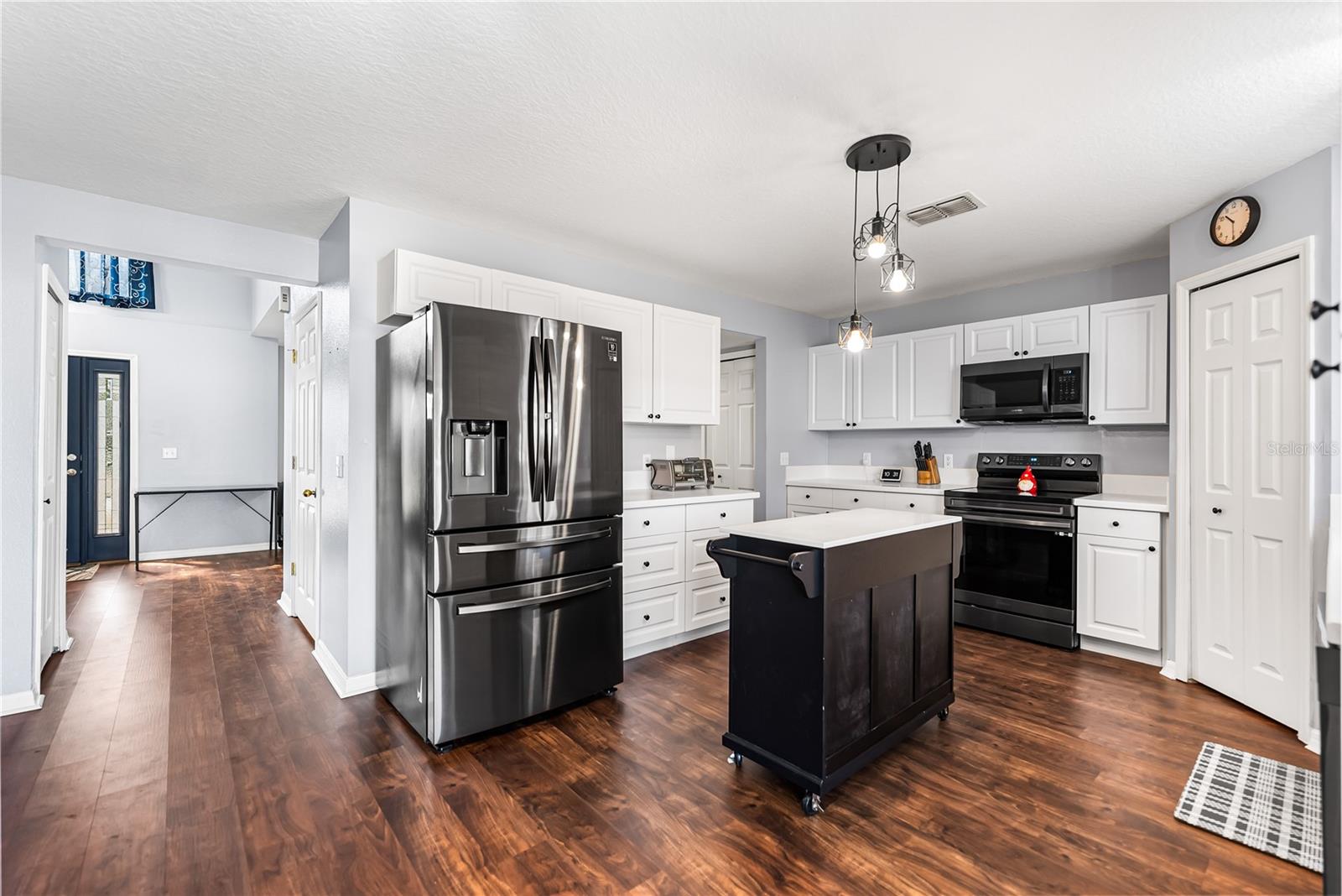 Kitchen with corner pantry