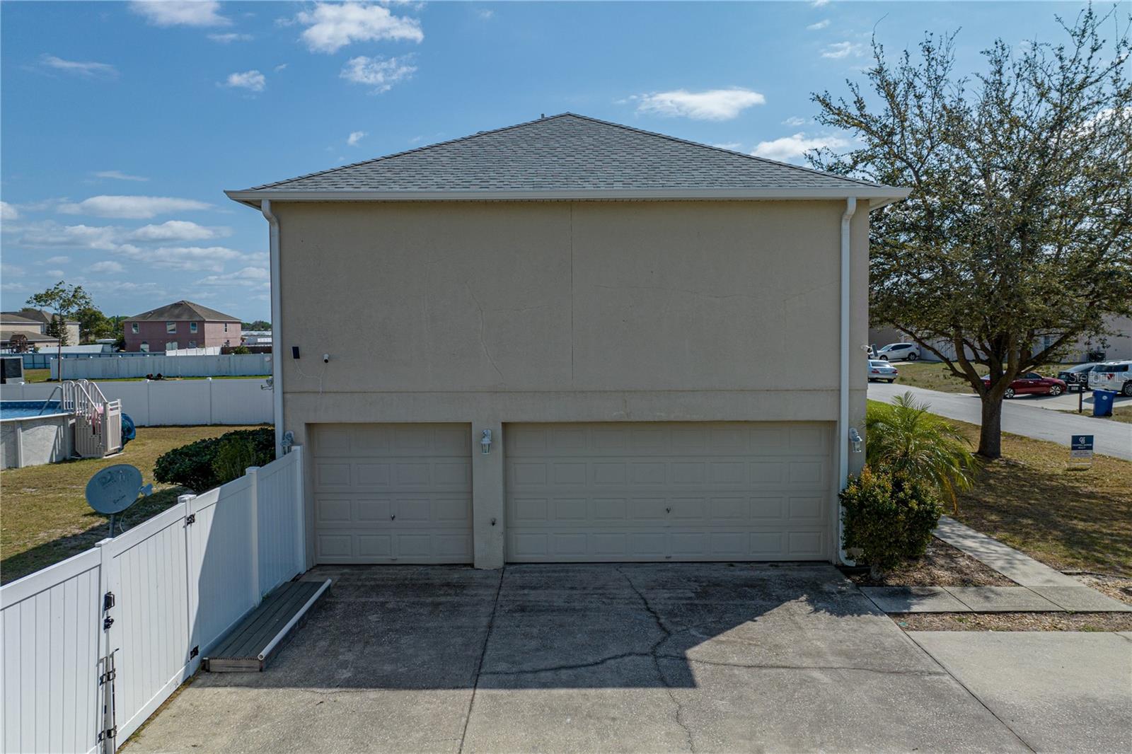 Side view 3 car garage