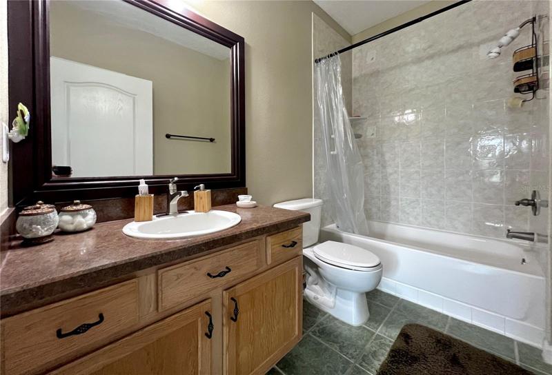 GORGEOUS AND SPACIOUS MASTER BATH... CHECK OUT THAT CUSTOM MIRROR PLUS ADULT SIZE TUB FOR YOUR FULL BODY RELAXATION! AHHHHHHHH!!!