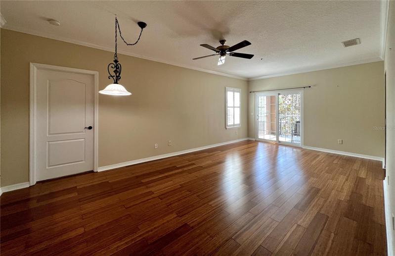 ATTENTION TO DESIGN... CROWN MOULDING, BAHAMA SHUTTERS, FRENCH DOOR STYLE SLIDERS, CUSTOM LIGHT FIXTURES AND THAT BEAUTY-FULL BAMBOO FLOORING!!!!