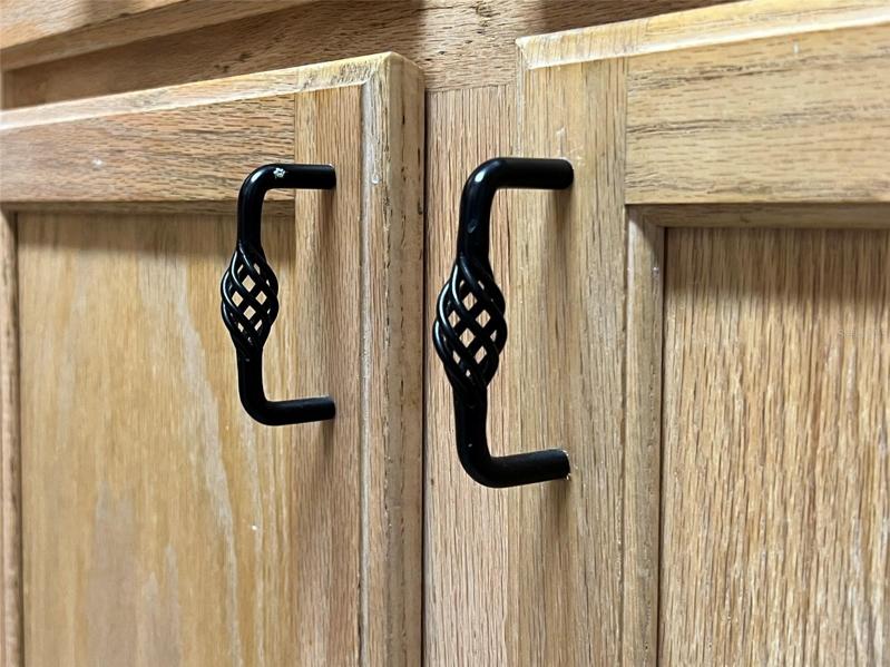 ATTENTION TO DESIGN DETAILS... WROUGHT IRON PULLS THROUGHOUT... NICE!