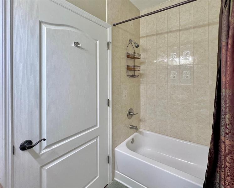 GUEST BATH COMPLETE WITH TUB AND SHOWER... BEAUTIFULLY DESIGNED DOORS AND MORE!
