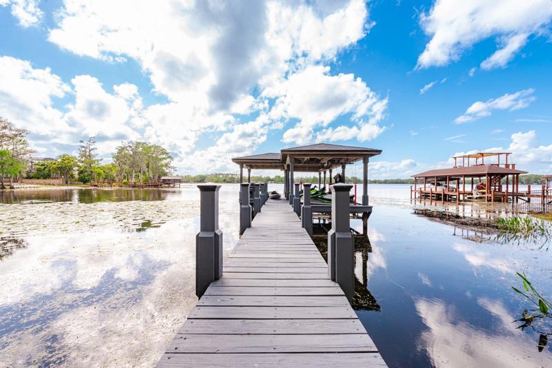 When you are not relaxing poolside, this property makes it easy to enjoy the lake life with a private boat ramp to take your boat in and out of the lake, dock with power lifts for your boat and jet skis and a bonus - the property is irrigated with water from the lake! 