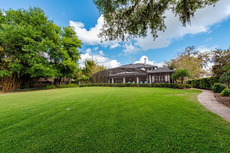 This 1 ½ acre gated estate delivers a stunning main home complete with gorgeous water and sunset views, screened pool and a full guest house with an extended garage for a total of seven stalls between both homes!