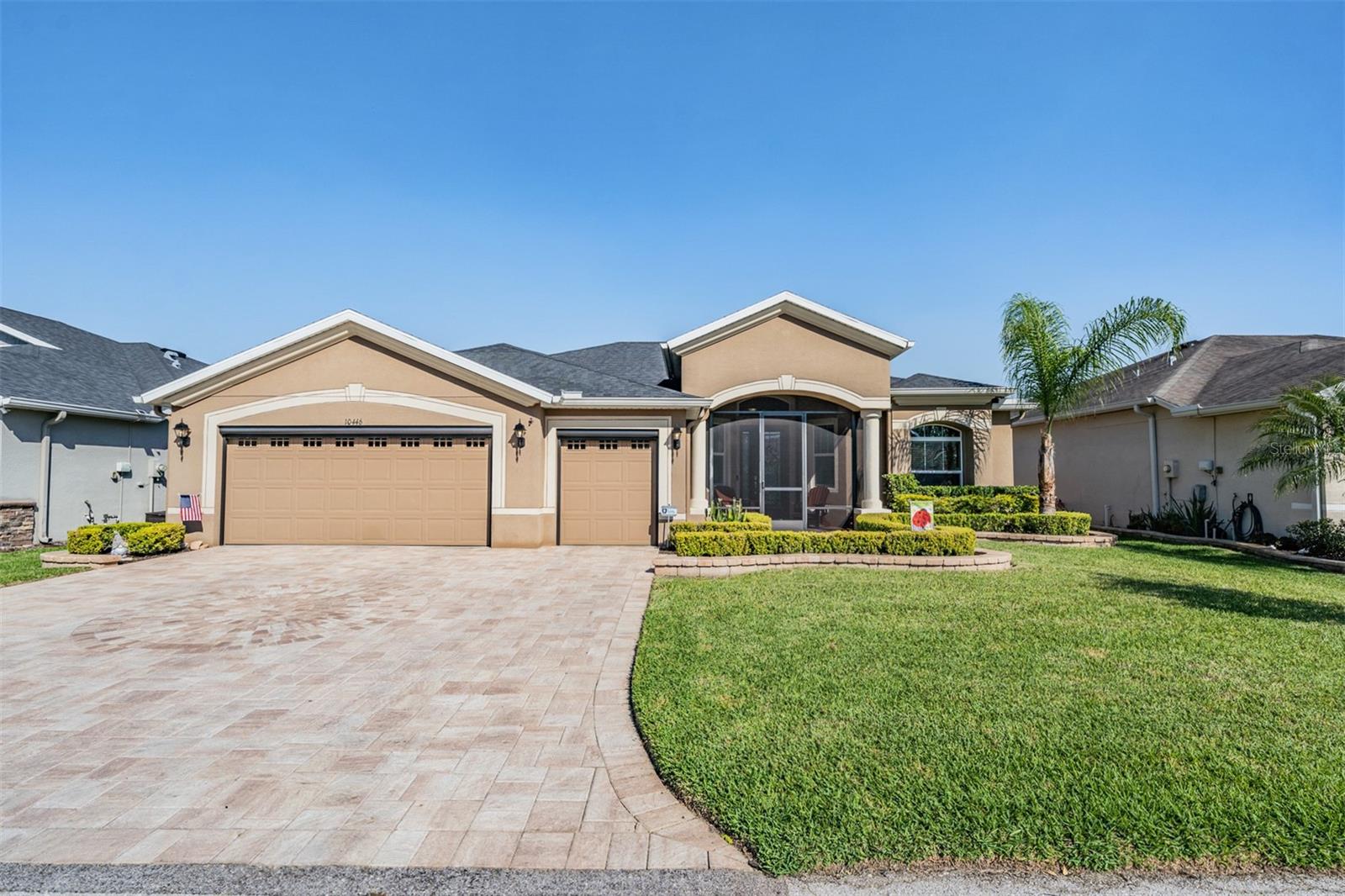 AUGUSTA plan with 2 ft extension on front &amp; Circular PAVER Medallion in oversized Driveway!