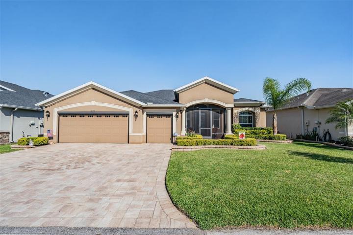 AUGUSTA plan with 2 ft extension on front & Circular PAVER Medallion in oversized Driveway!