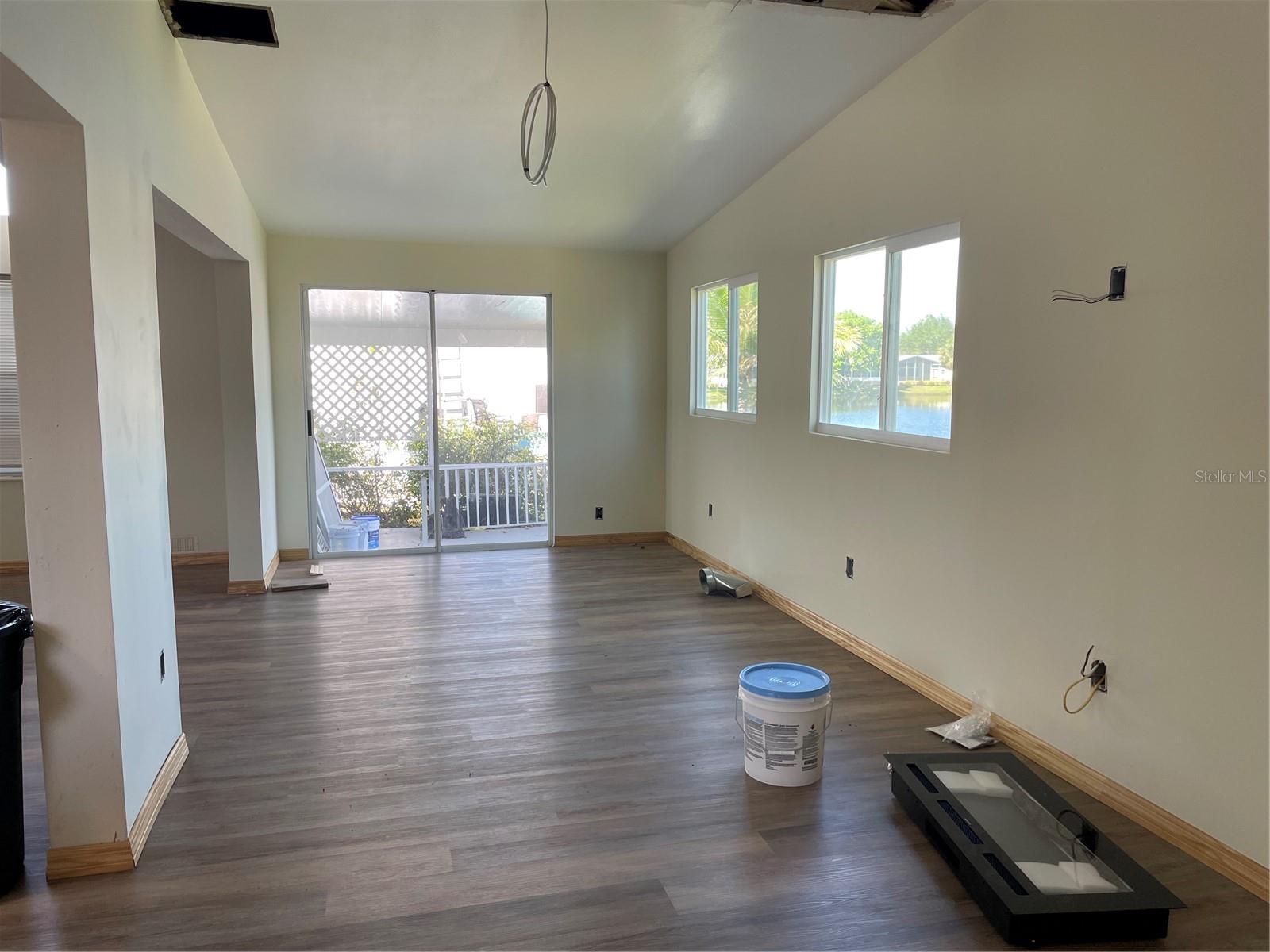Florida room, electric wall mount fireplace