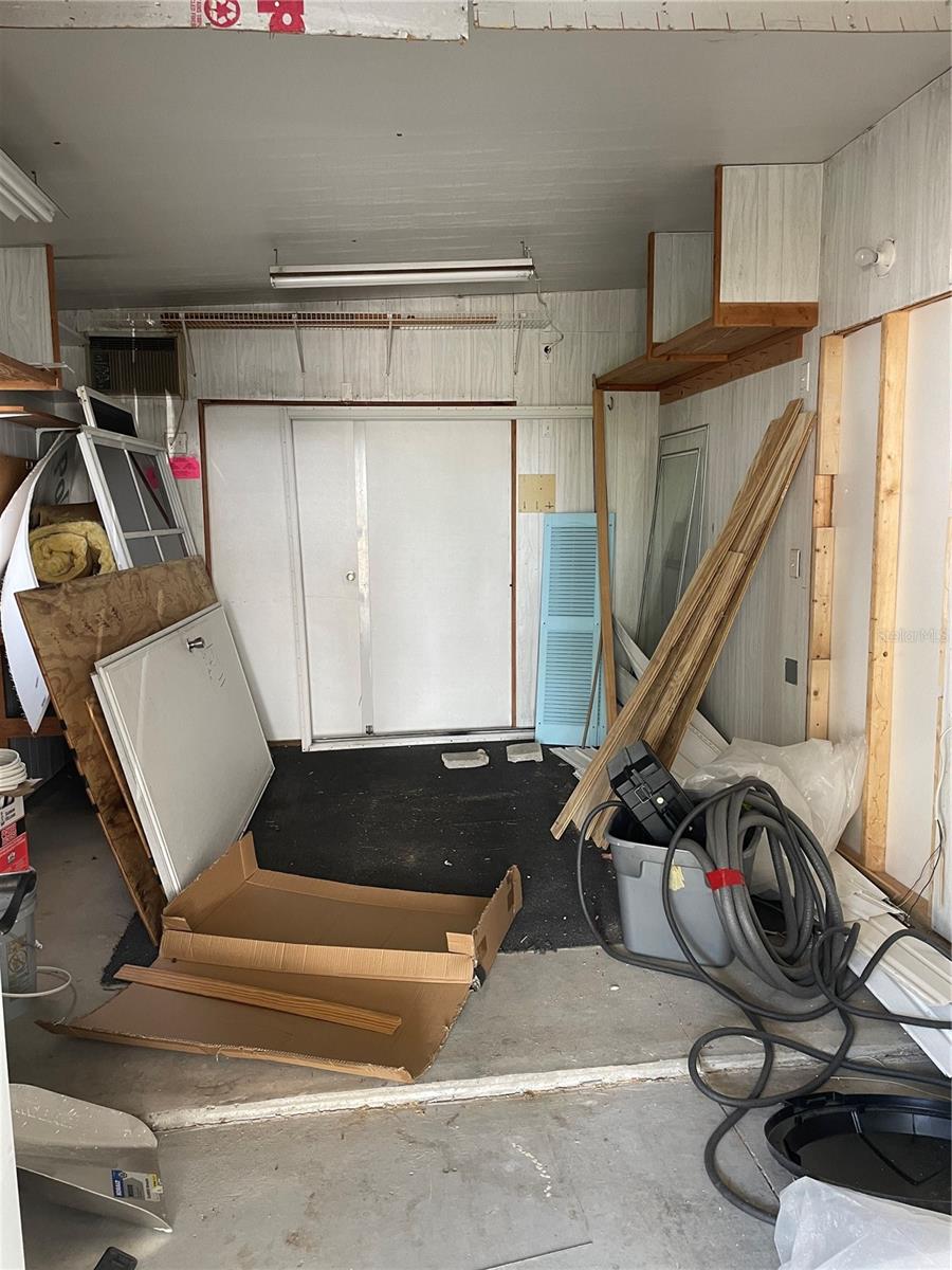 Storage room end of carport
