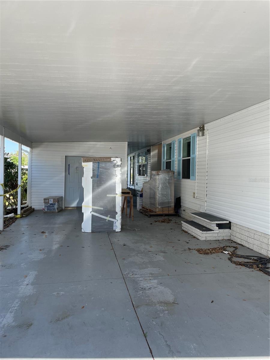Carport, new fridge and AC