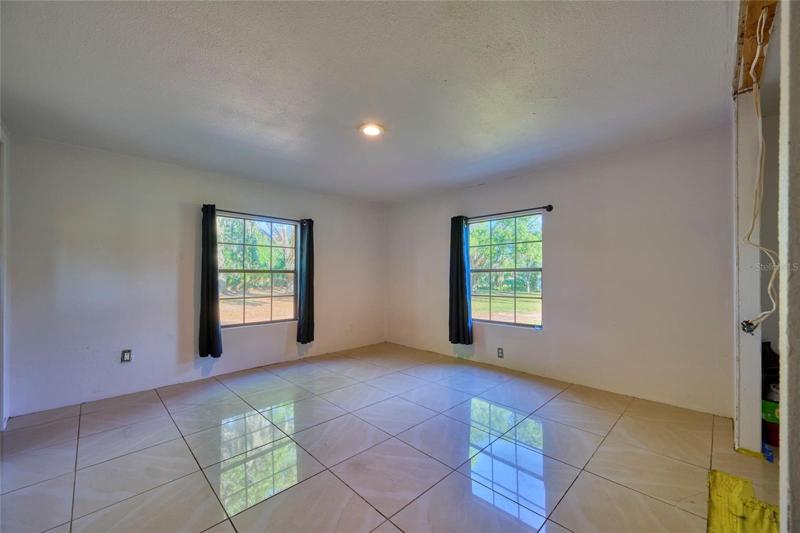 Master bedroom provides two windows for natural lighting