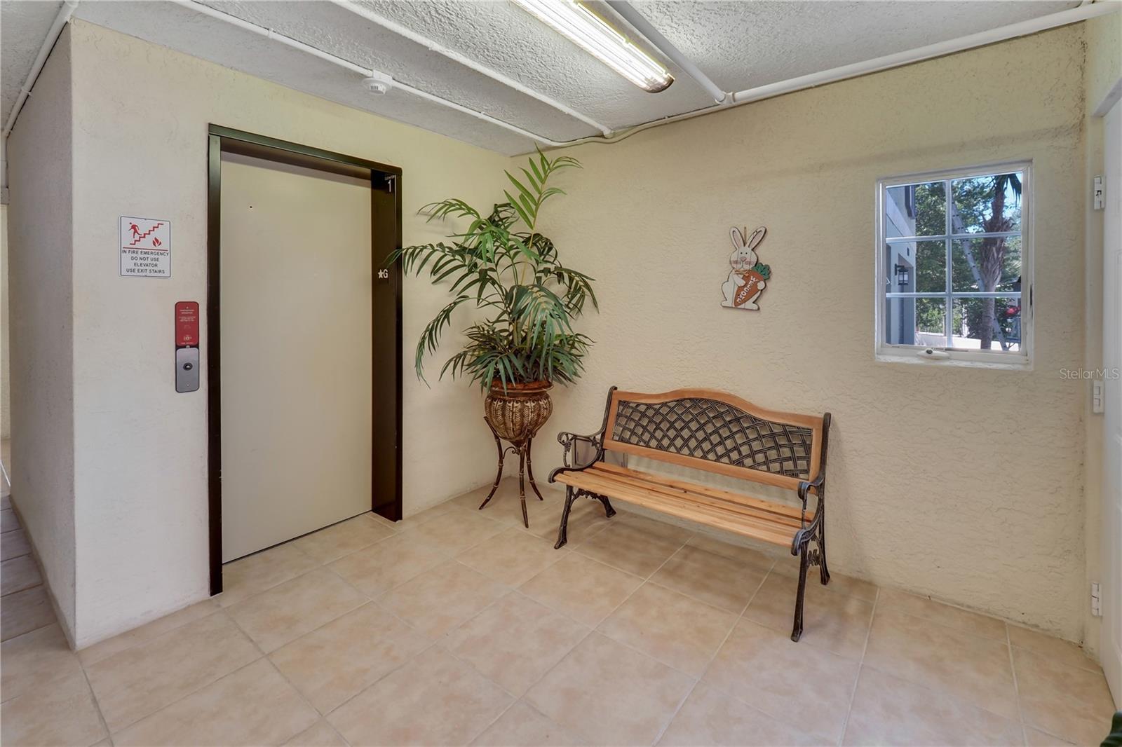 Interior entry with view of elevator