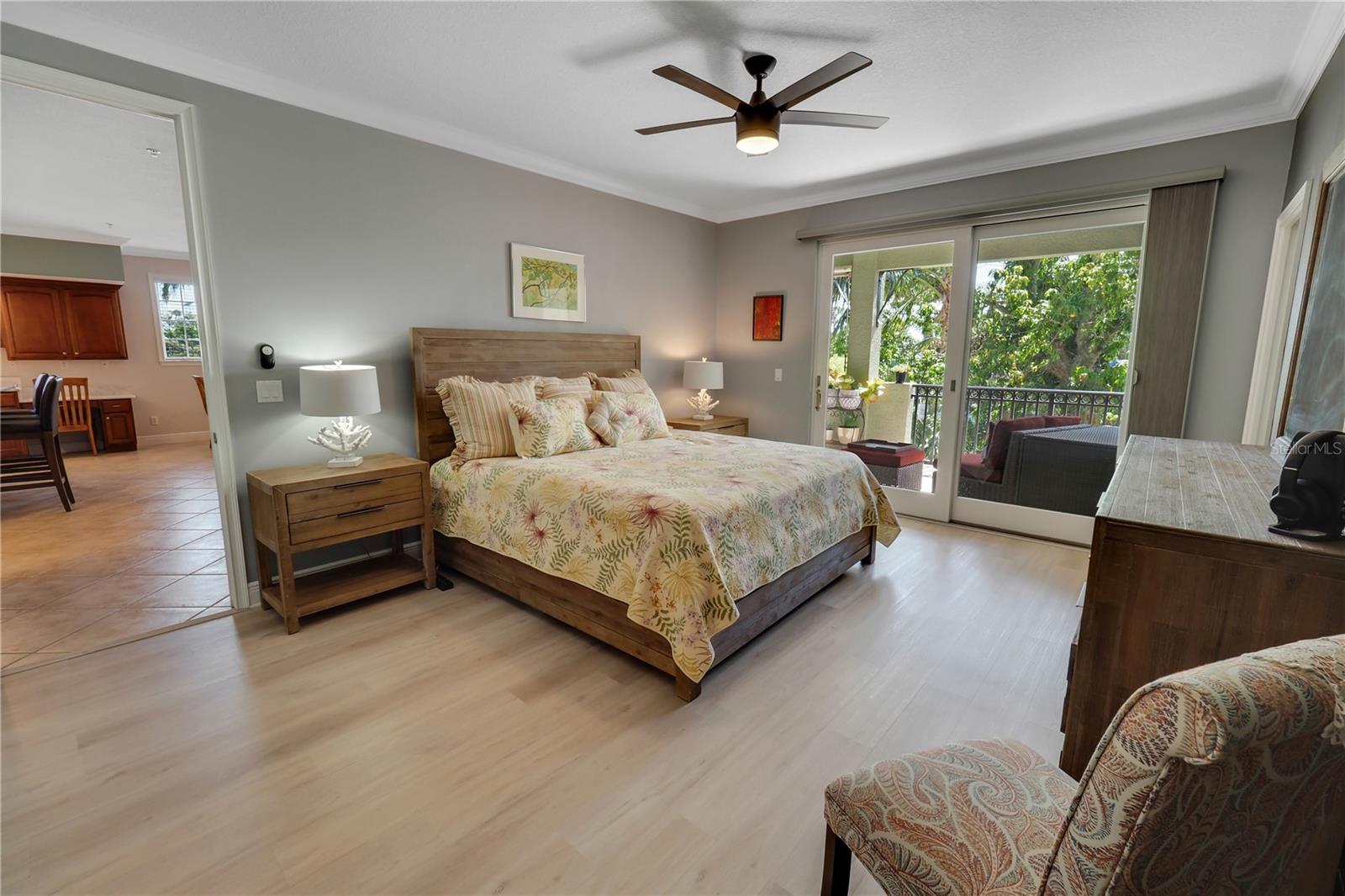 Master Bedroom with view of lanai and foliage