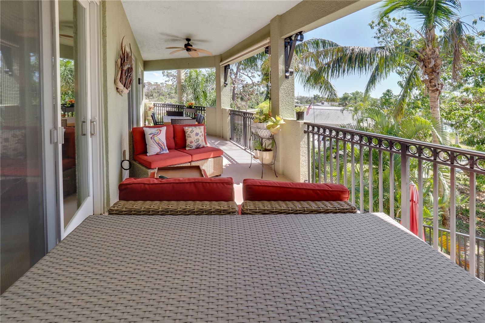 View of Large Lanai.  Sliding doors lead to Master Bedroom