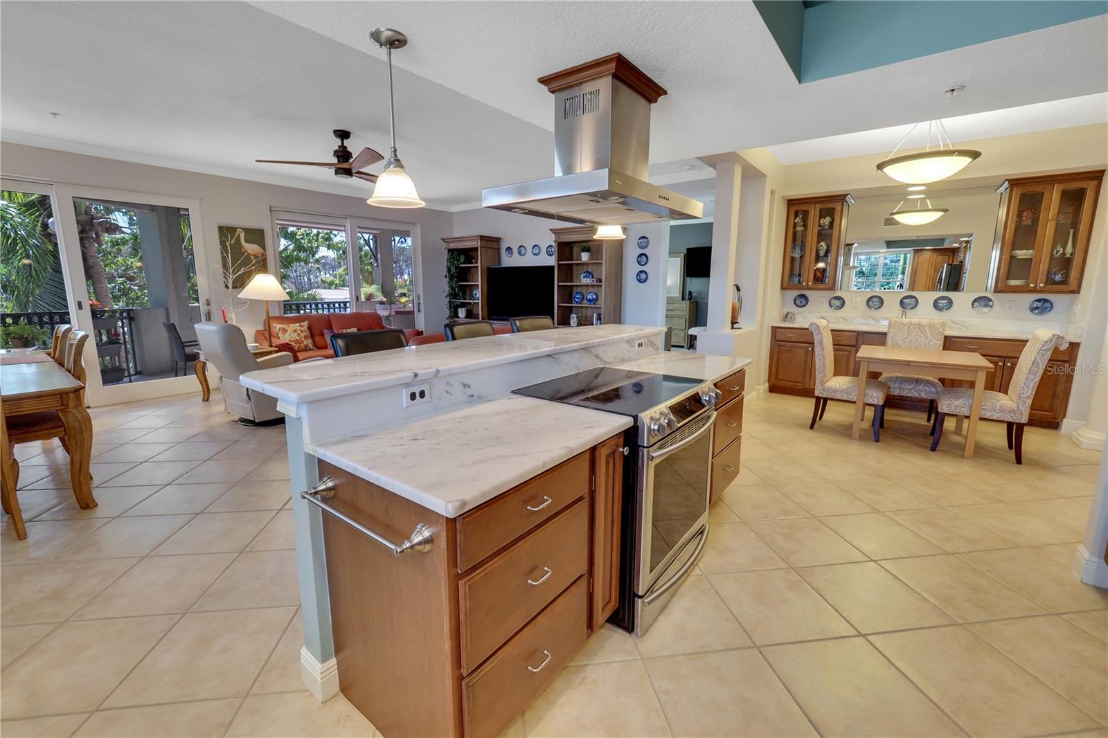 Breakfast bar with stove and overhead vent