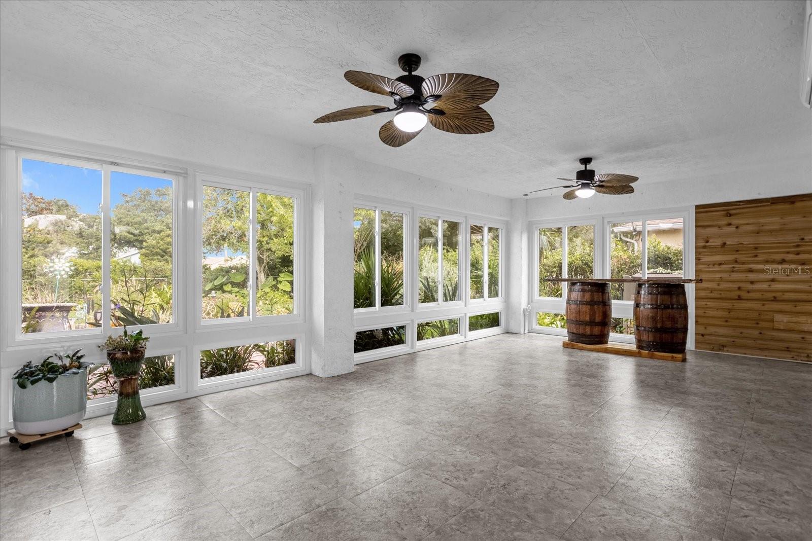 Large Florida Room with brand new windows, heat and A/C adding 378sf of living space