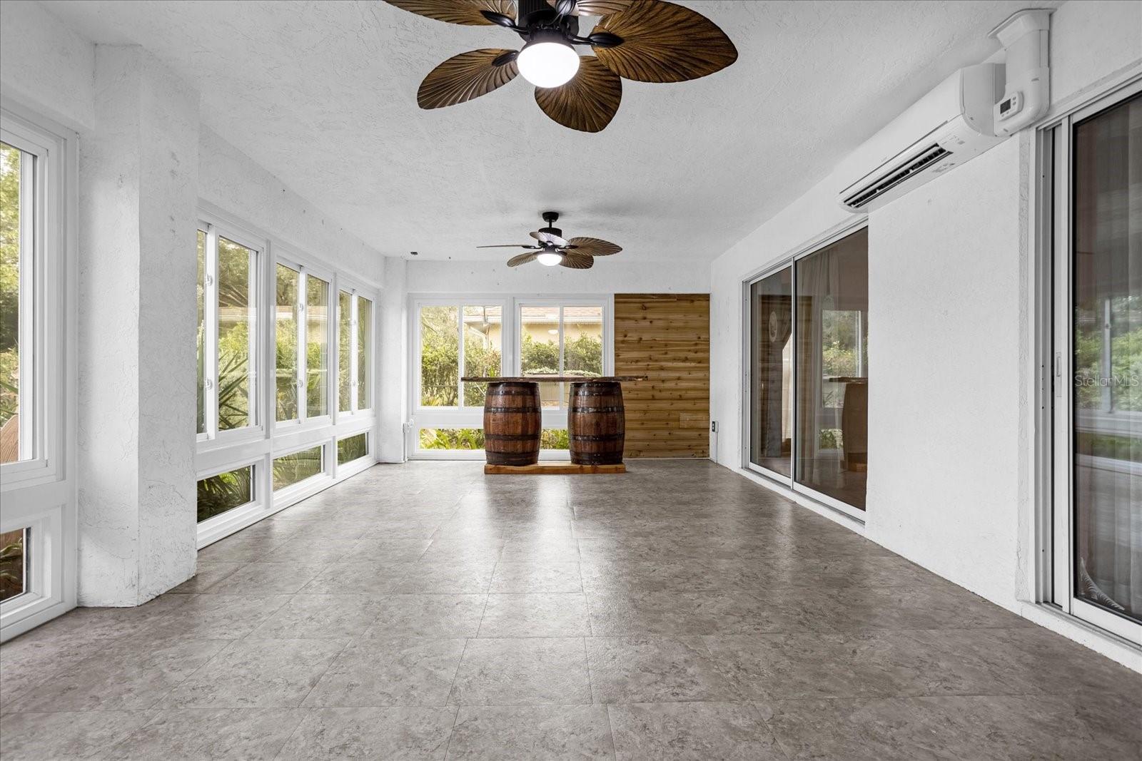 Large Florida Room with brand new windows, heat and A/C adding 378sf of living space