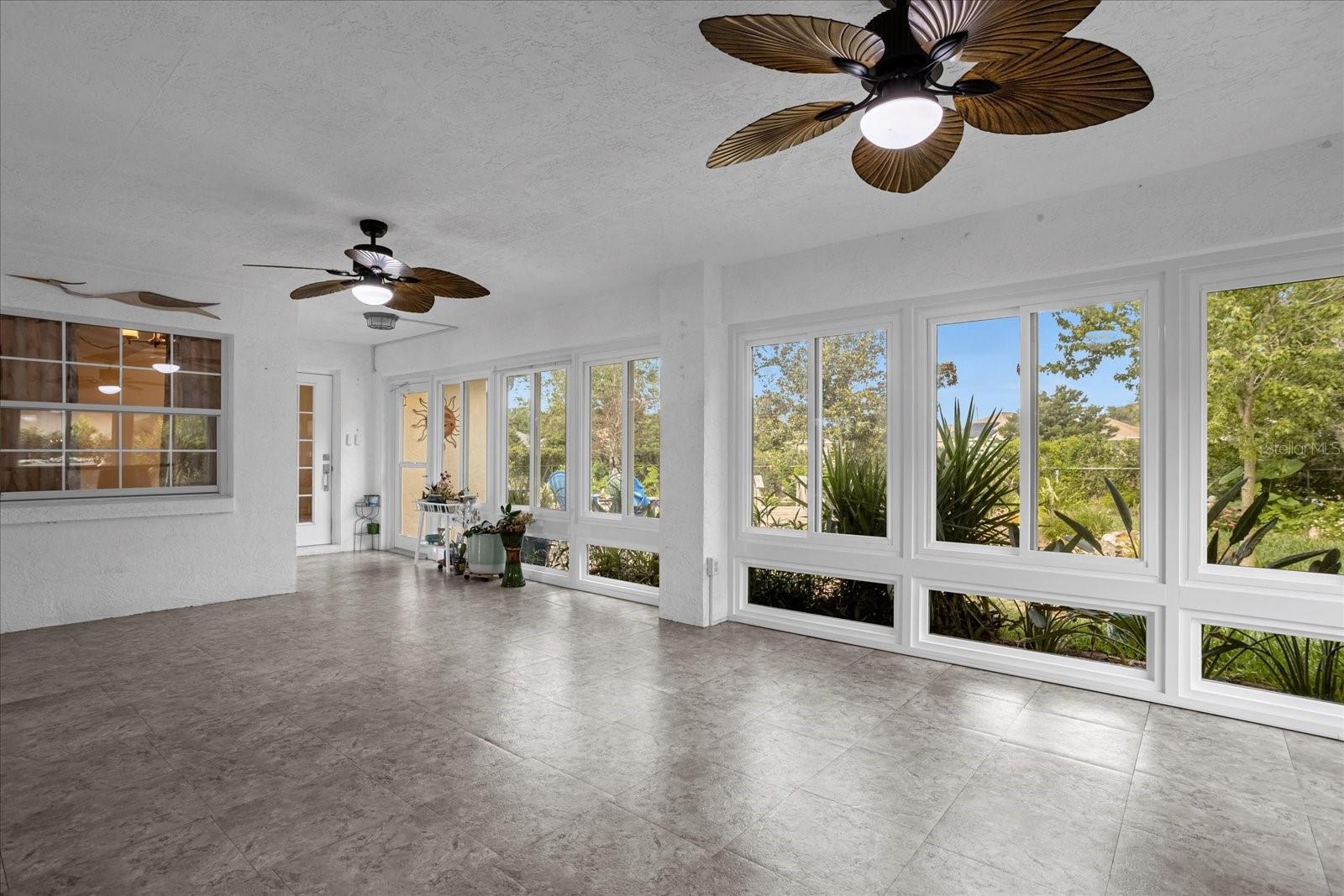 Large Florida Room with brand new windows, heat and A/C adding 378sf of living space