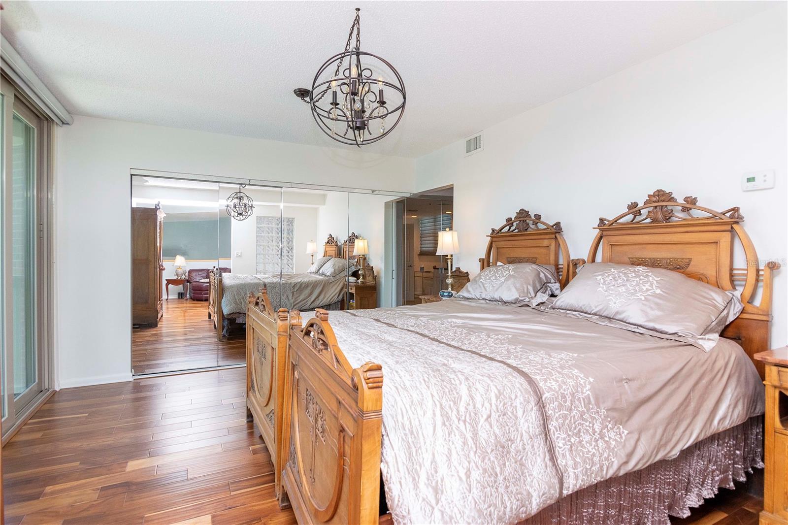 The Master Bedroom lives on the second level of this home making it completely private from all the other Bedrooms