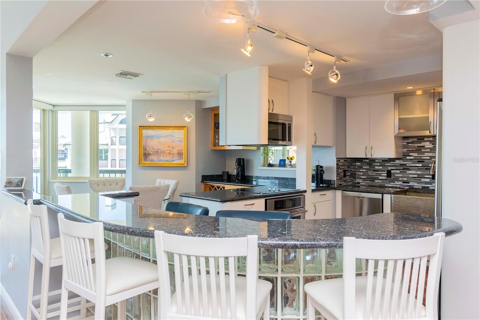 Multiple seating areas at the bar are perfect for entertaining